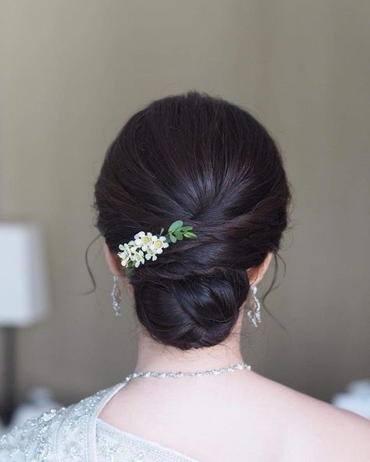 4) Low Chignon Bun:
